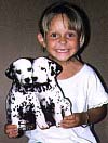 Child and dalmations